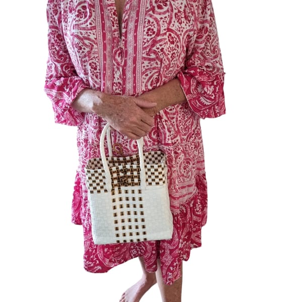 lady holding small Jali Bag lady holding small Jali Bag