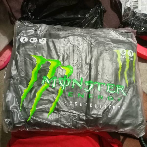 Grosir jas hujan setelan monster