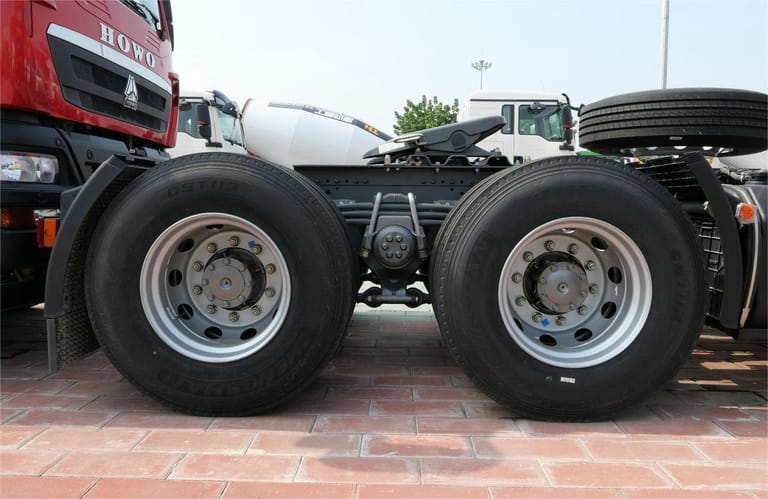 HOWO TX 430HP 6×4 tractor truck 12R22.5 tires close-up view HOWO TX 430HP 6×4 tractor truck 12R22.5 tires close-up view