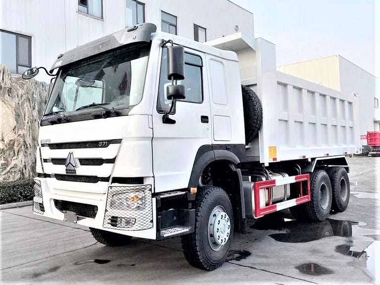 HOWO 371HP 6×4 Dump Truck front three quarter view high roof cab and bumper HOWO 371HP 6×4 Dump Truck front three quarter view high roof cab and bumper