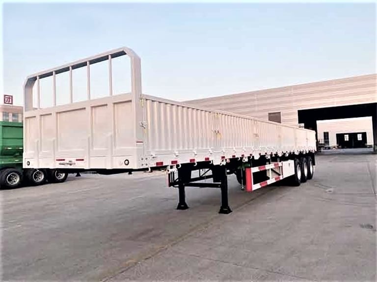 3 Axle Side Wall Semi Trailer front three-quarter view emphasizing reinforced frame and stability 3 Axle Side Wall Semi Trailer front three-quarter view emphasizing reinforced frame and stability