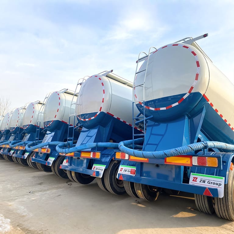 3/4 view of Pneumatic Semi Tanker for Cement – high-capacity pneumatic trailer designed for safe and efficient dry cement transport. 3/4 view of Pneumatic Semi Tanker for Cement – high-capacity pneumatic trailer designed for safe and efficient dry cement transport.
