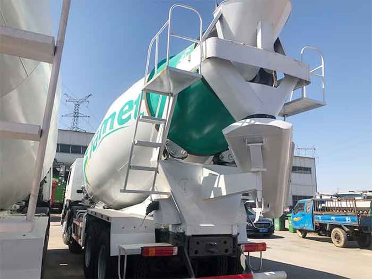 Back perspective of HOWO 8X4 High-Capacity Concrete Mixer Truck showing mixer drum, discharge chute, and rear axles Back perspective of HOWO 8X4 High-Capacity Concrete Mixer Truck showing mixer drum, discharge chute, and rear axles