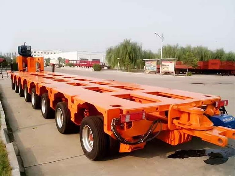 3/4 rear angle view of ZW Group Goldhofer Hydraulic Modular Trailer demonstrating modular flexibility 3/4 rear angle view of ZW Group Goldhofer Hydraulic Modular Trailer demonstrating modular flexibility