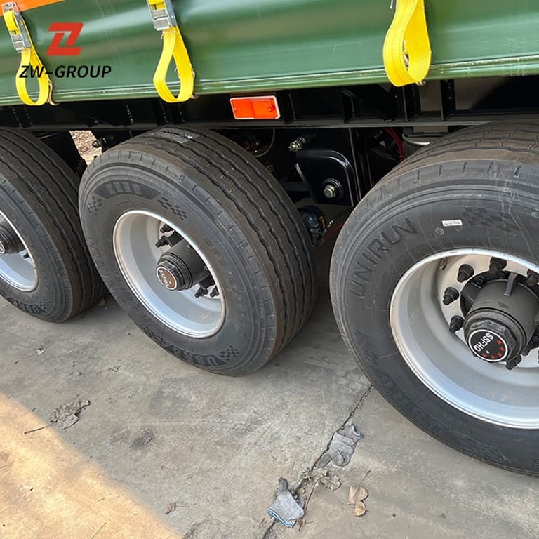ZW 3-Axle Curtain Side Trailer heavy-duty tire close-up showing tread pattern and durability ZW 3-Axle Curtain Side Trailer heavy-duty tire close-up showing tread pattern and durability