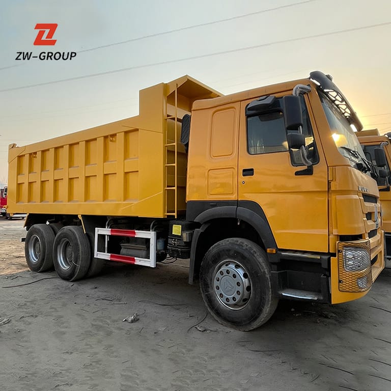Front 3/4 view of used HOWO 371HP 6x4 Dump Truck showing cabin, chassis, and cargo body Front 3/4 view of used HOWO 371HP 6x4 Dump Truck showing cabin, chassis, and cargo body