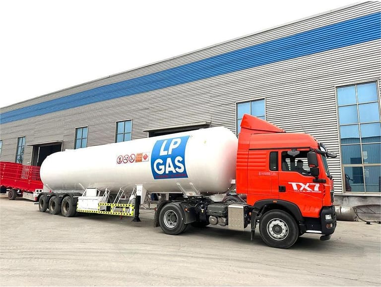 3/4 front view of LPG Tanker Semi Trailer — showing cylindrical LPG tank, reinforced chassis, and safety valves for secure fuel transport. 3/4 front view of LPG Tanker Semi Trailer — showing cylindrical LPG tank, reinforced chassis, and safety valves for secure fuel transport.