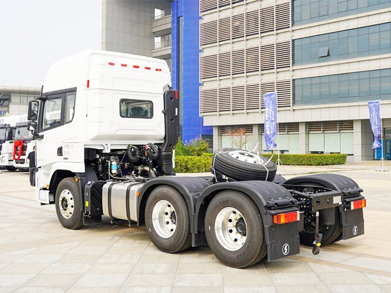 Shacman X5000 460HP 6x4 Tractor Truck rear three-quarter view highlighting chassis, suspension, and fifth wheel for heavy-duty hazardous and bulk cargo logistics