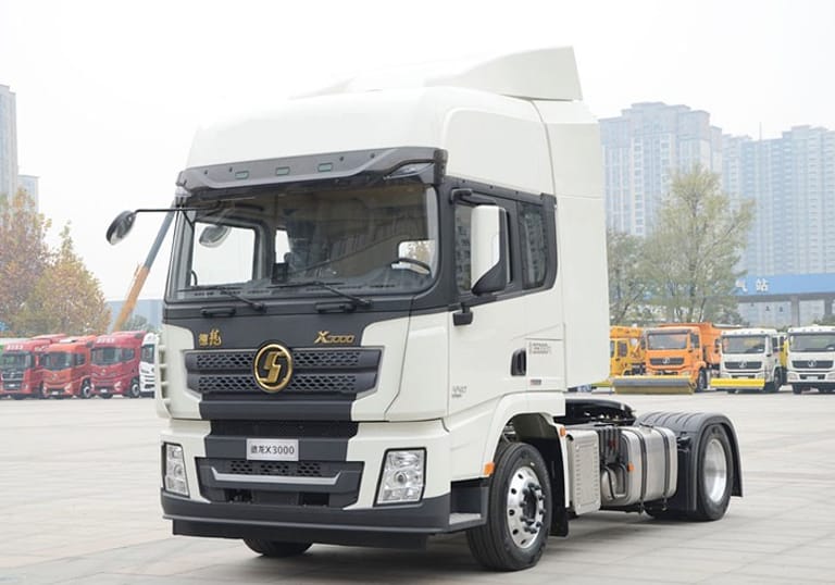 Shacman X3000 440HP 4x2 Tractor Truck front three-quarter view showing cab, chassis, and drivetrain for efficient long-haul operations Shacman X3000 440HP 4x2 Tractor Truck front three-quarter view showing cab, chassis, and drivetrain for efficient long-haul operations