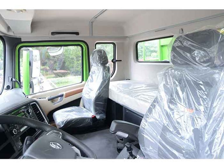 Shacman X5000 8X4 dump truck cabin with ergonomic design, air conditioning, and ZF-assisted steering for driver comfort