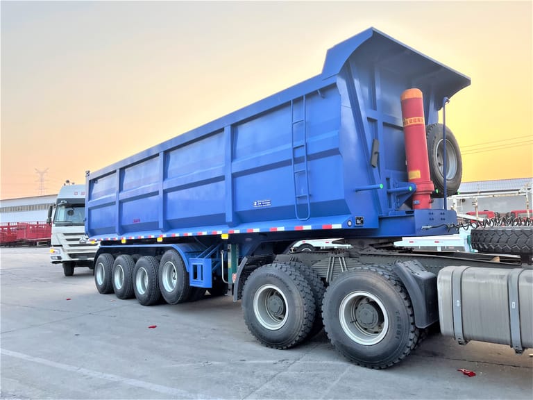 3/4 front view of 4 Axle Dump Semi Trailer for Mining Coal – heavy-duty trailer designed for safe and efficient coal transport in mining operations. 3/4 front view of 4 Axle Dump Semi Trailer for Mining Coal – heavy-duty trailer designed for safe and efficient coal transport in mining operations.
