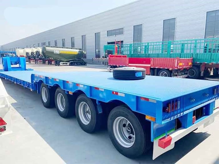 4 Axle 80 Ton RGN Low Bed Trailer Rear 3/4 View | Hydraulic Removable Gooseneck Trailer for Heavy Machinery 4 Axle 80 Ton RGN Low Bed Trailer Rear 3/4 View | Hydraulic Removable Gooseneck Trailer for Heavy Machinery