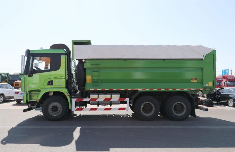 Shacman X3000 6x4 dump truck side view with 5.8m heavy-duty steel cargo box Shacman X3000 6x4 dump truck side view with 5.8m heavy-duty steel cargo box
