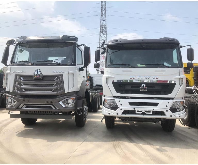 HOWO NX 400HP 6×4 tractor truck front view, showcasing high-roof cab and heavy-duty chassis. HOWO NX 400HP 6×4 tractor truck front view, showcasing high-roof cab and heavy-duty chassis.