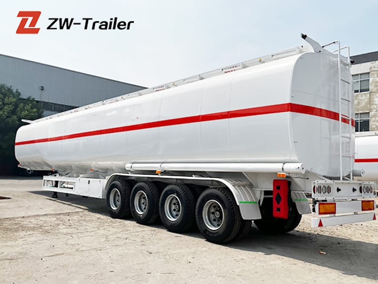 3/4 view of 4 Axle 45,000L Carbon Steel Diesel Tanker Semi Trailer – heavy-duty fuel transport trailer built for safe and efficient diesel delivery. 3/4 view of 4 Axle 45,000L Carbon Steel Diesel Tanker Semi Trailer – heavy-duty fuel transport trailer built for safe and efficient diesel delivery.