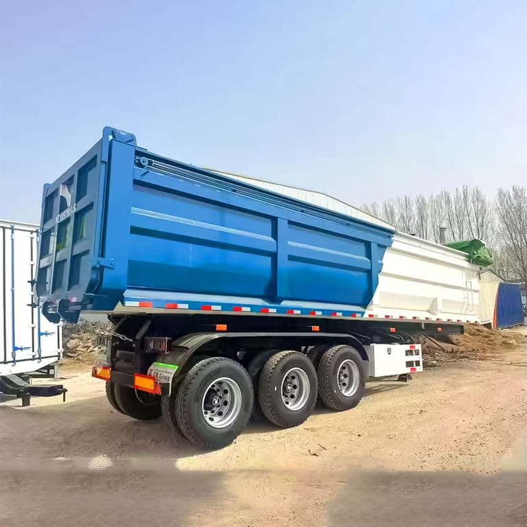 3/4 view of 60 Ton Rear Dump Semi Trailer – heavy-duty rear dump trailer designed for safe and efficient transport of construction materials. 3/4 view of 60 Ton Rear Dump Semi Trailer – heavy-duty rear dump trailer designed for safe and efficient transport of construction materials.