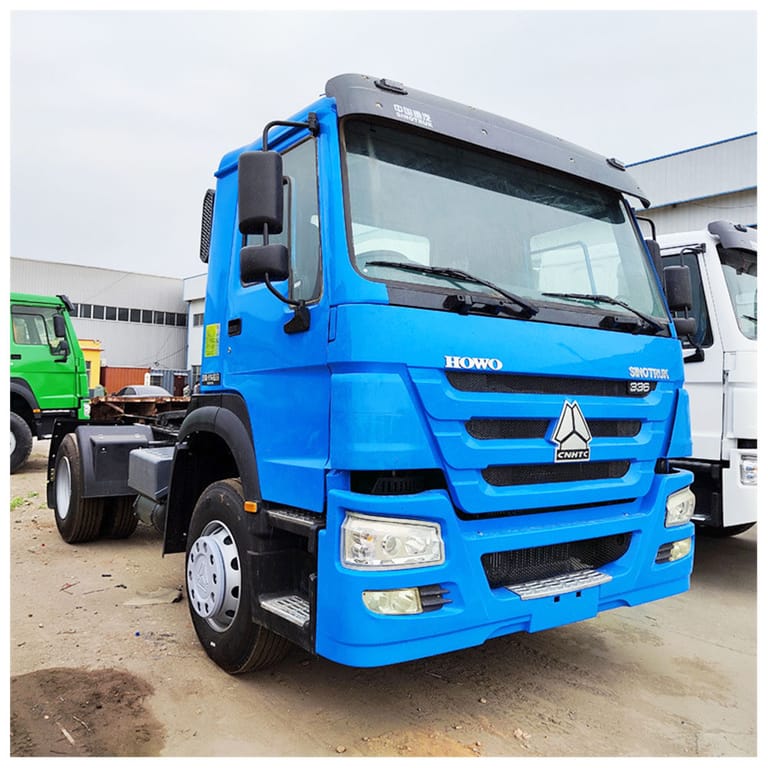 HOWO 336HP 4×2 Tractor Truck 3/4 angle view, highlighting high-roof cab, robust frame, and aluminum fuel tank for efficient logistics operations HOWO 336HP 4×2 Tractor Truck 3/4 angle view, highlighting high-roof cab, robust frame, and aluminum fuel tank for efficient logistics operations