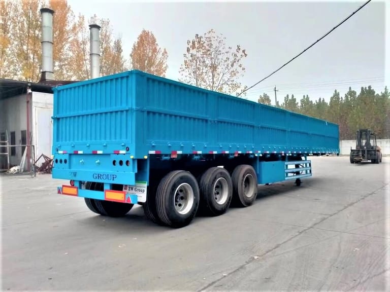 ZW Group 3 Axle 60T Side Wall Semi Trailer rear three-quarter view showing durable side walls and heavy-duty tires ZW Group 3 Axle 60T Side Wall Semi Trailer rear three-quarter view showing durable side walls and heavy-duty tires