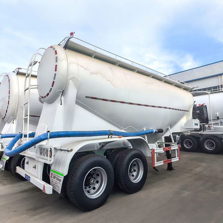 3/4 view of 35CBM Dry Bulk Cement Trailer – high-capacity dry bulk cement trailer designed for safe and efficient transport of cement. 3/4 view of 35CBM Dry Bulk Cement Trailer – high-capacity dry bulk cement trailer designed for safe and efficient transport of cement.