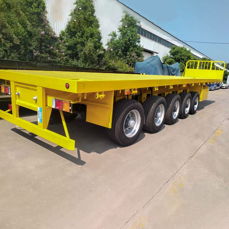 3/4 rear view of 5 Axle Cargo Flatbed Semi Trailer — showing sturdy rear frame, tail structure, and spacious flatbed platform for efficient loading and unloading. 3/4 rear view of 5 Axle Cargo Flatbed Semi Trailer — showing sturdy rear frame, tail structure, and spacious flatbed platform for efficient loading and unloading.