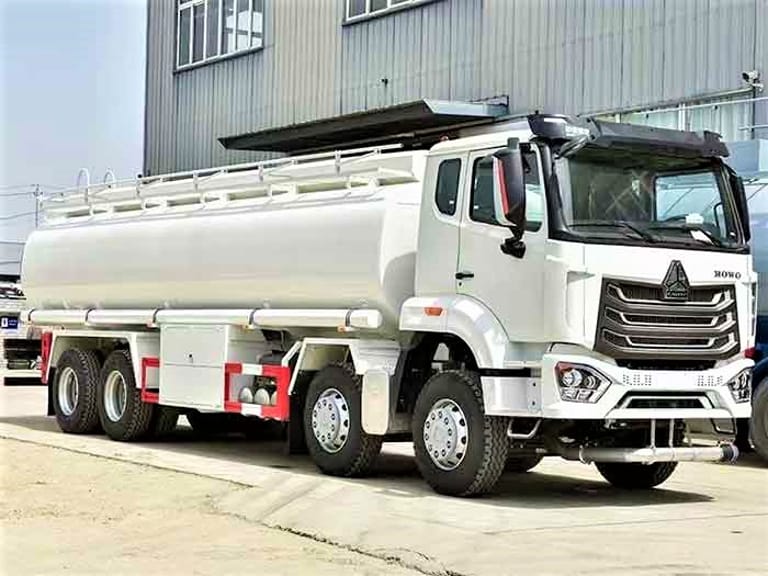 HOWO 300HP fuel tanker truck front-side angle showing cabin and 20,000-liter tank body HOWO 300HP fuel tanker truck front-side angle showing cabin and 20,000-liter tank body