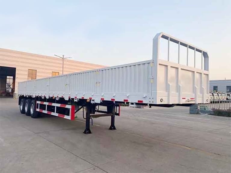3 Axle Side Wall Semi Trailer front three-quarter view emphasizing reinforced frame and stability 3 Axle Side Wall Semi Trailer front three-quarter view emphasizing reinforced frame and stability