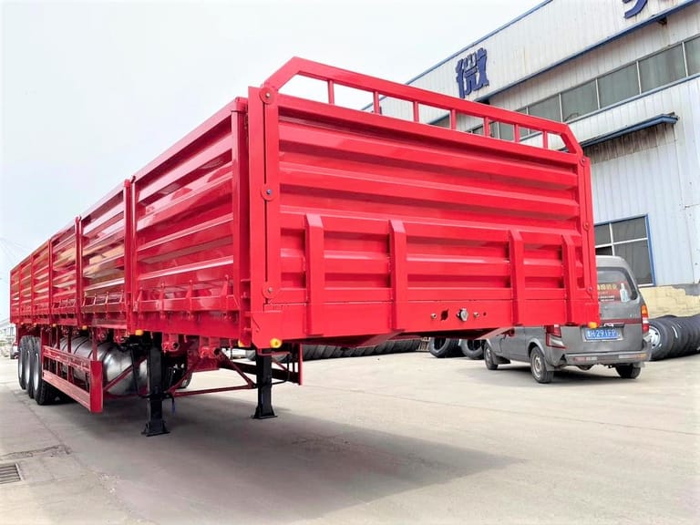 3 Axle 60T Side Board Trailer front three-quarter view showing high-strength chassis, 1200mm side boards, and mechanical suspension 3 Axle 60T Side Board Trailer front three-quarter view showing high-strength chassis, 1200mm side boards, and mechanical suspension
