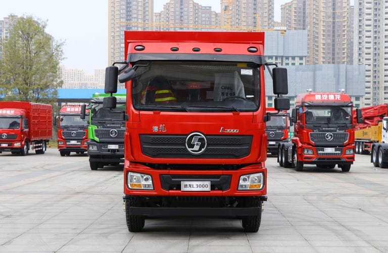 Shacman L3000 8X4 300HP dump truck front view, heavy-duty construction vehicle with reinforced chassis Shacman L3000 8X4 300HP dump truck front view, heavy-duty construction vehicle with reinforced chassis