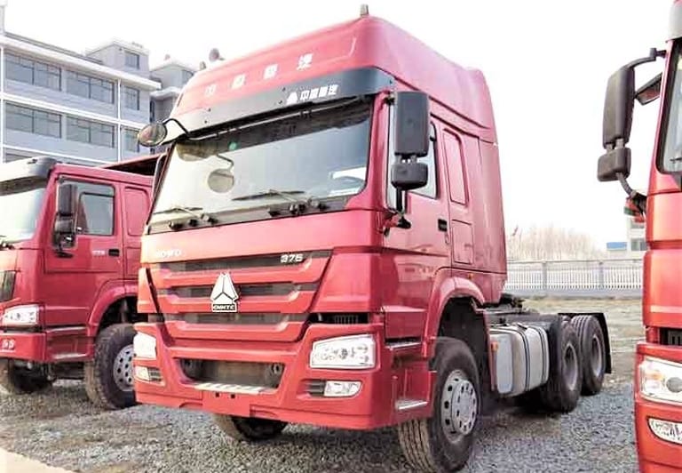 Front 3/4 view highlighting cab and high-roof design Front 3/4 view highlighting cab and high-roof design