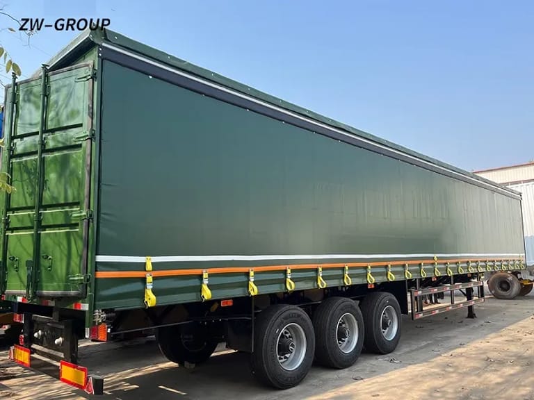 ZW 3-Axle Curtain Side Trailer rear 3/4 angle showing robust suspension and landing gear ZW 3-Axle Curtain Side Trailer rear 3/4 angle showing robust suspension and landing gear