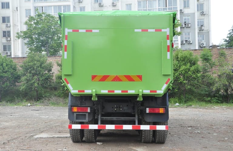 Shacman M3000 6X4 350HP dump truck rear view, hydraulic rear dump body, reinforced chassis and heavy-duty tires for bulk material transport Shacman M3000 6X4 350HP dump truck rear view, hydraulic rear dump body, reinforced chassis and heavy-duty tires for bulk material transport