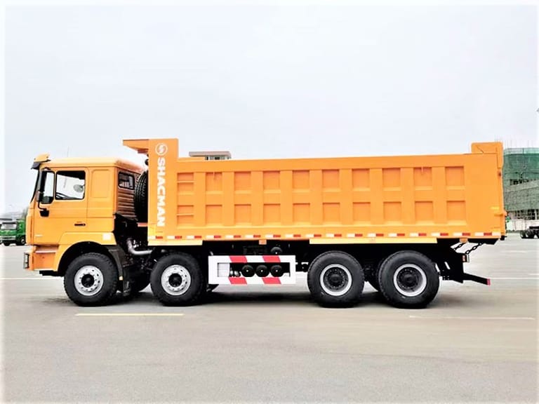 Shacman F3000 8x4 400HP dump truck side view showing cargo body and wheels