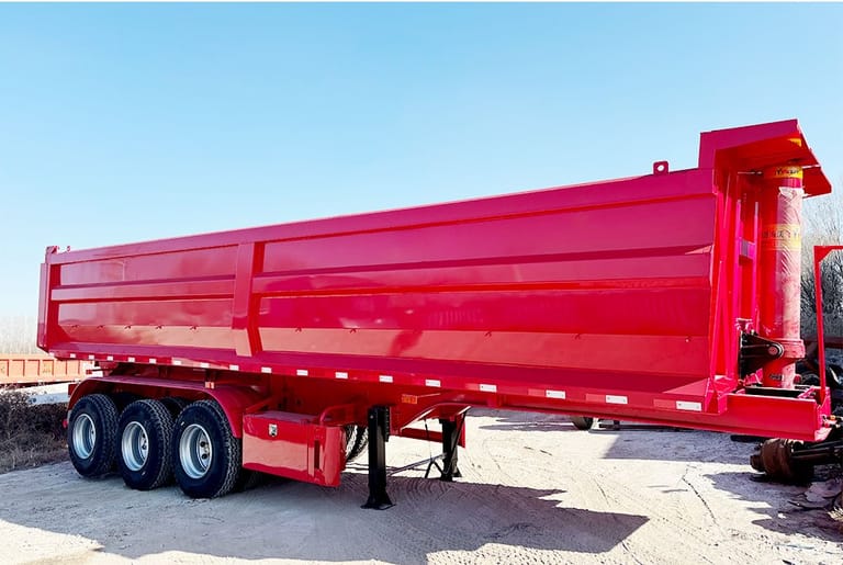 Side view of 45CBM U Shape Dump Semi Trailer – showing U-shaped cargo body, reinforced chassis, and dual-axle design for stable bulk material transport. Side view of 45CBM U Shape Dump Semi Trailer – showing U-shaped cargo body, reinforced chassis, and dual-axle design for stable bulk material transport.