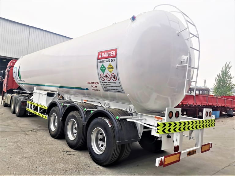 3/4 rear view of 3 Axle LPG Semi Trailer — showing rear frame, LPG tank structure, and discharge/loading valves for safe operations. 3/4 rear view of 3 Axle LPG Semi Trailer — showing rear frame, LPG tank structure, and discharge/loading valves for safe operations.