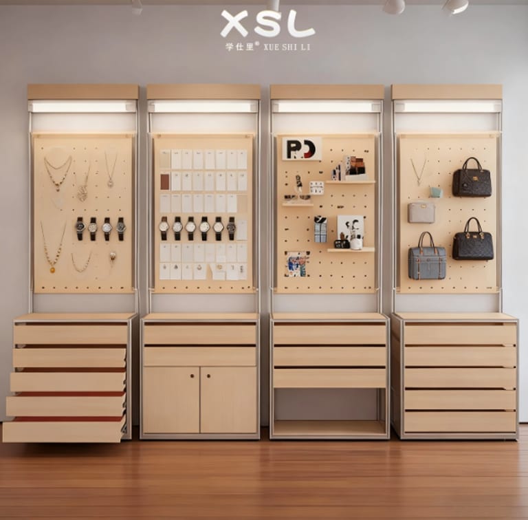 Modular Pegboard Display: Removable pegboard panels (with adjustable hooks) let you rearrange phone cases/gadgets in seconds – fit 50+ phone cases per panel. Integrated Storage: Under-display drawers/cabinets provide hidden space for inventory restocks, cleaning tools, or small packaging materials. Retail-Focused Lighting: Built-in LED strip lights (on top of the frame) enhance product visibility (critical for colorful phone case designs). Durable & Lightweight: Aluminum profile frame is easy to move (for pop-up stores) yet supports up to 30kg per shelf/pegboard.