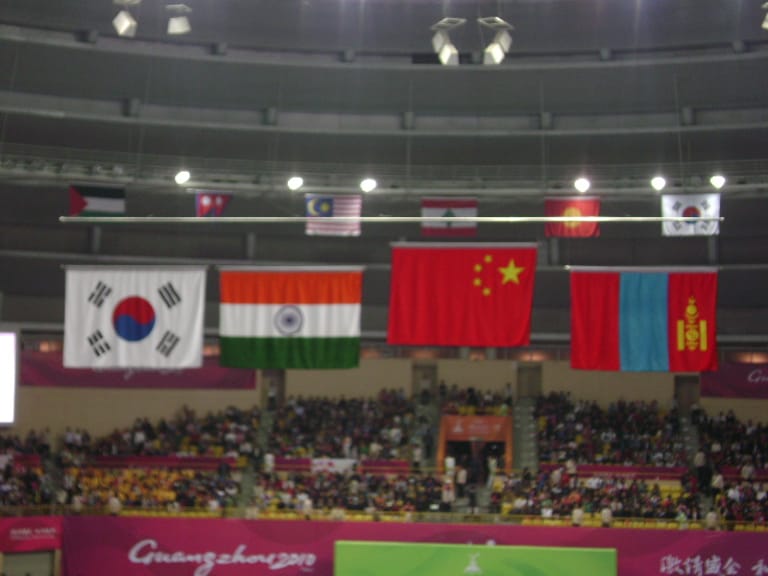 Horizontal electric flag raising system installed on indoor arena ceiling Horizontal electric flag raising system installed on indoor arena ceiling