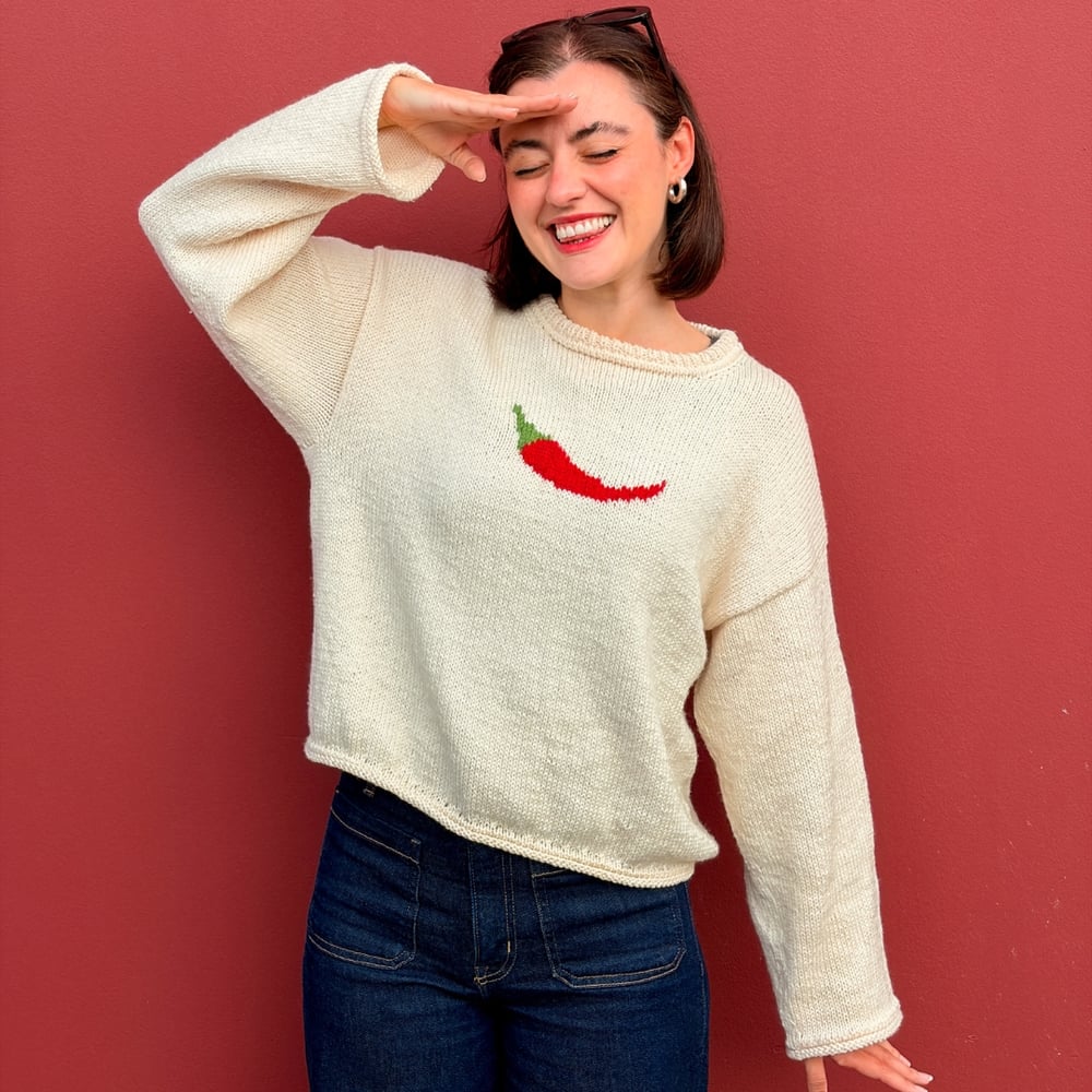 The Red Hot Chili Sweater, hand-knitted by an independent maker, worn