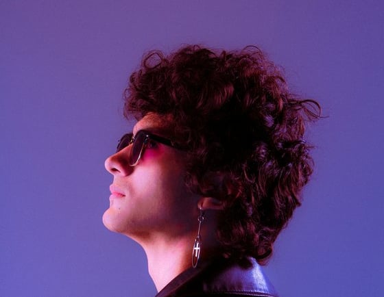 woman in black shirt wearing sunglasses