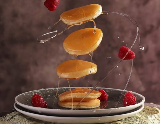sliced fruit on white ceramic plate