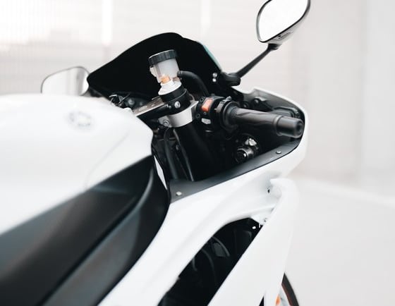 white and black sports bike