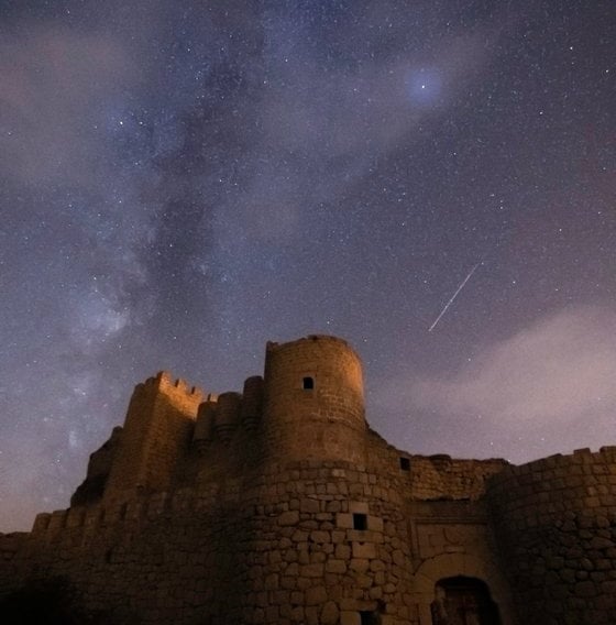 brown concrete building under starry night