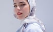 woman in white hijab smiling
