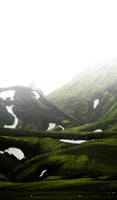 green mountain under white sky during daytime