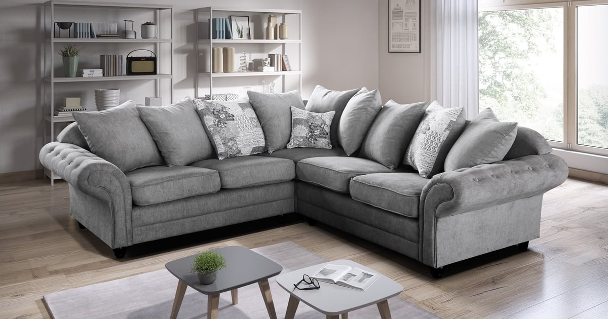 L shaped top light grey couch