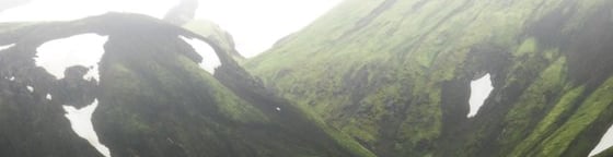 green mountain under white sky during daytime