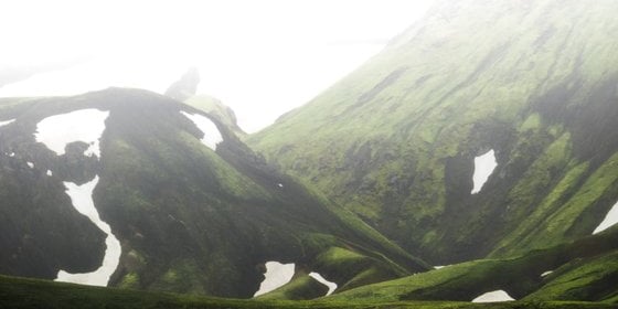 green mountain under white sky during daytime