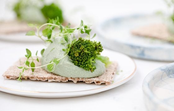green vegetable on white ceramic plate
