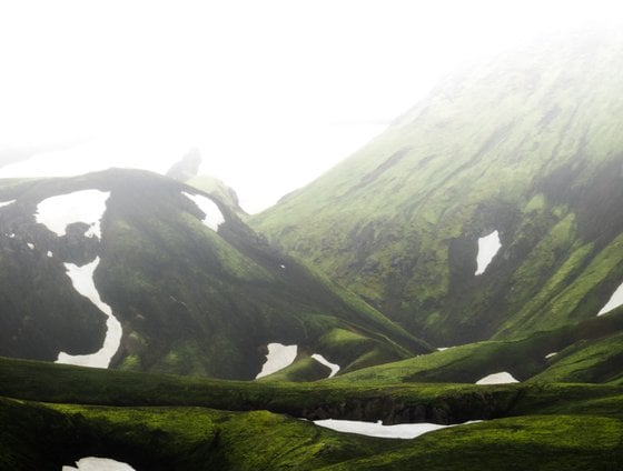 green mountain under white sky during daytime