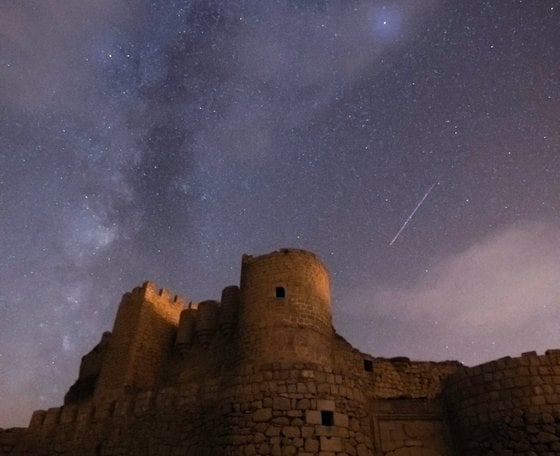 brown concrete building under starry night