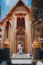 man and woman standing in front of brown concrete building during daytime